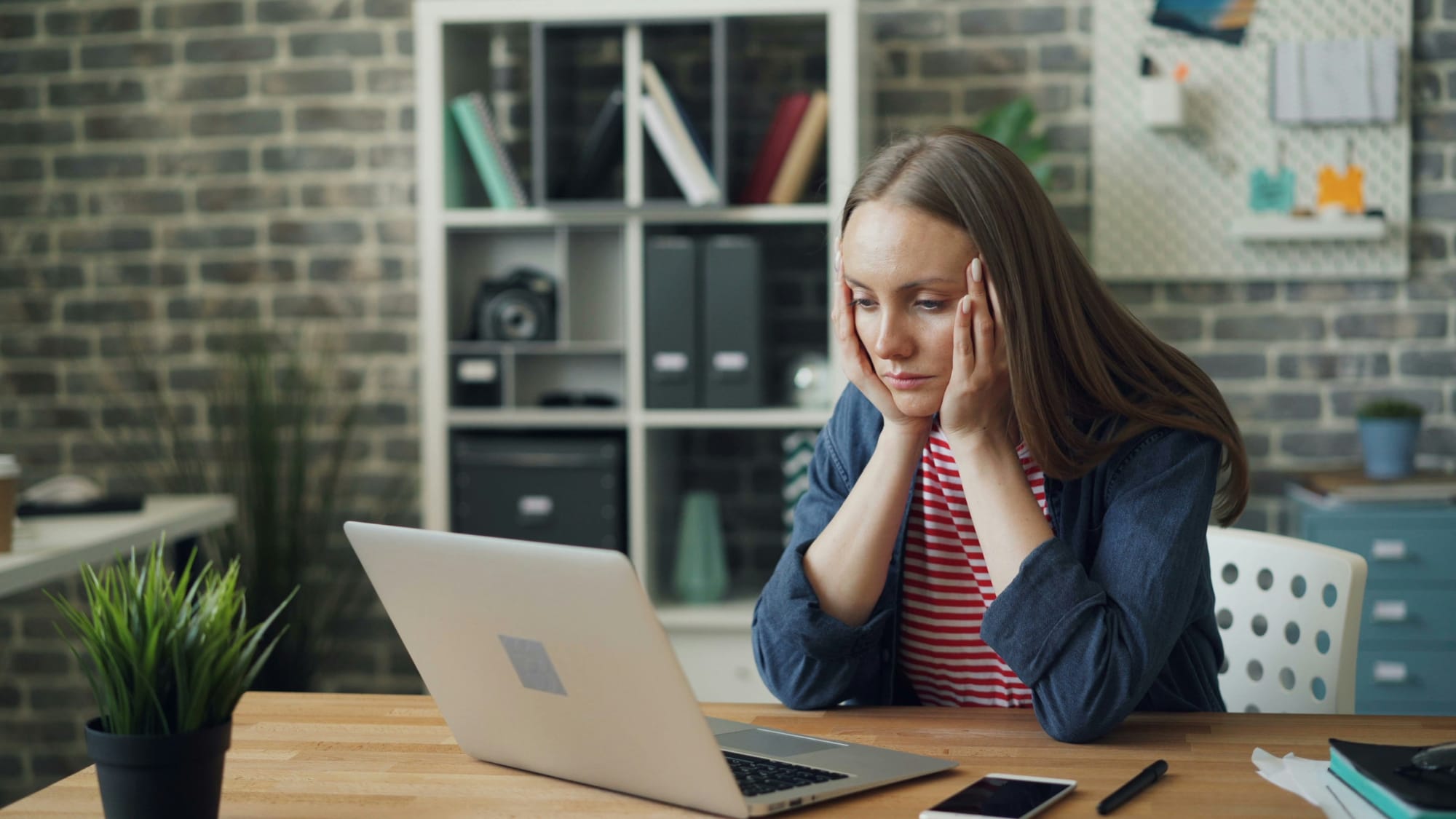 woman looking sad - Email Management Strategies