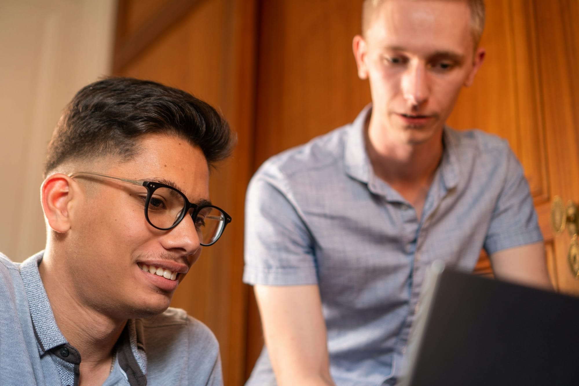 men on a laptop - Microsoft Productivity Tools 