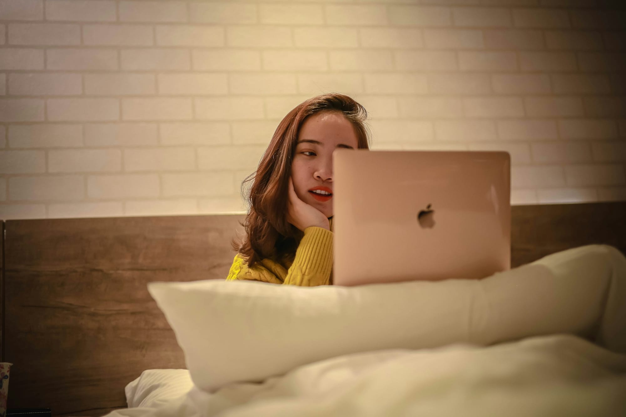 woman with a laptop - Best Free AI Tools