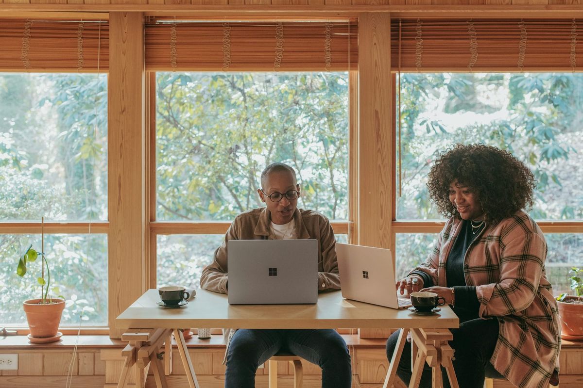 women on laptops - Email Sorter