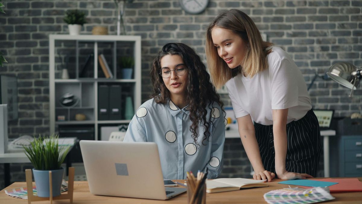 women on a laptop - How to Filter Out Emails in Gmail