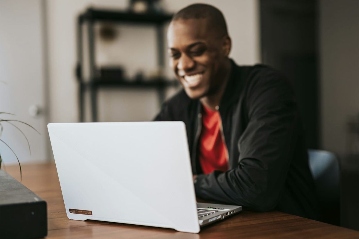 man smiling - Email Management Strategies