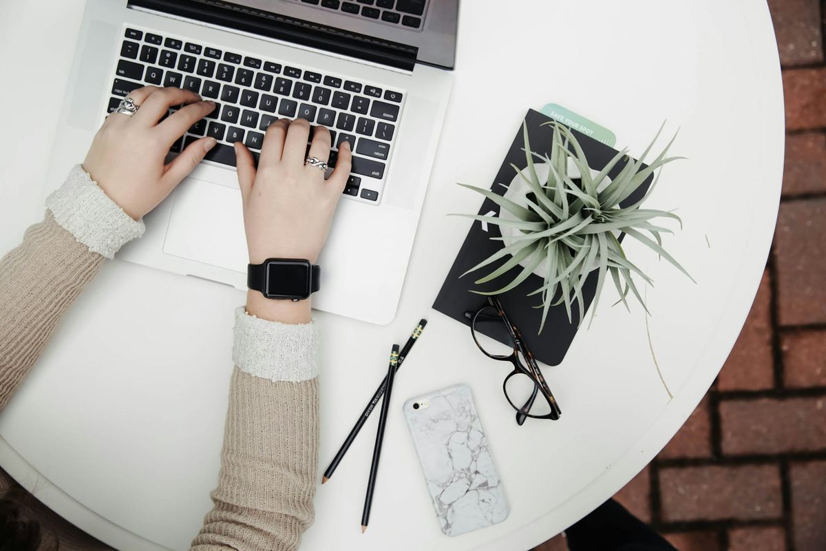 Person Working - How to Use AI to Take Meeting Notes