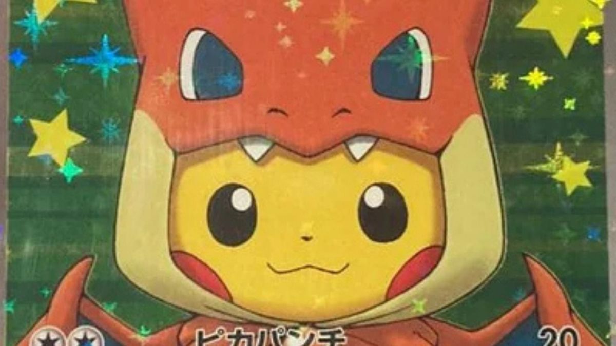 A Poncho Pikachu Charizard Y Pokémon card close up