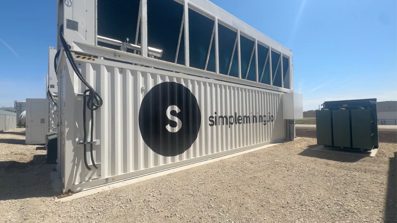 A Simple Mining hydro-cooled container with rooftop dry cooler and adjacent power transformer at one of our hydro sites.