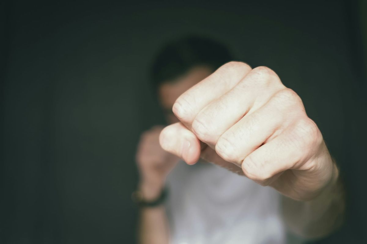 image of a fist, like a punch is being thrown at the camera