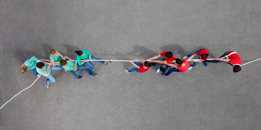 The us versus them tug of war / iStock