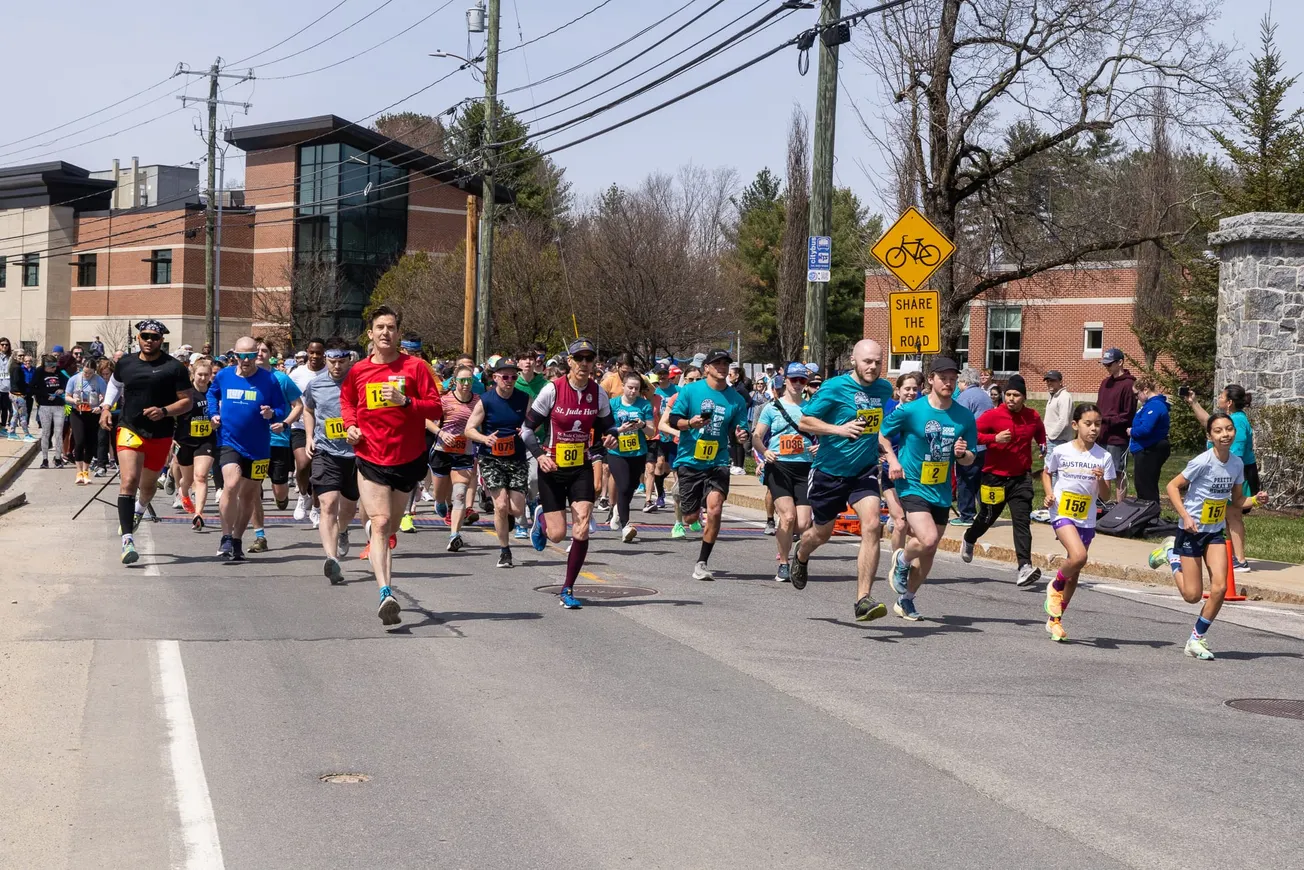 Runners take off from the starting line during the Nashua Soup Kitchen and Shelter 31st annual Run/Walk for Food and Shelter at Rivier University.