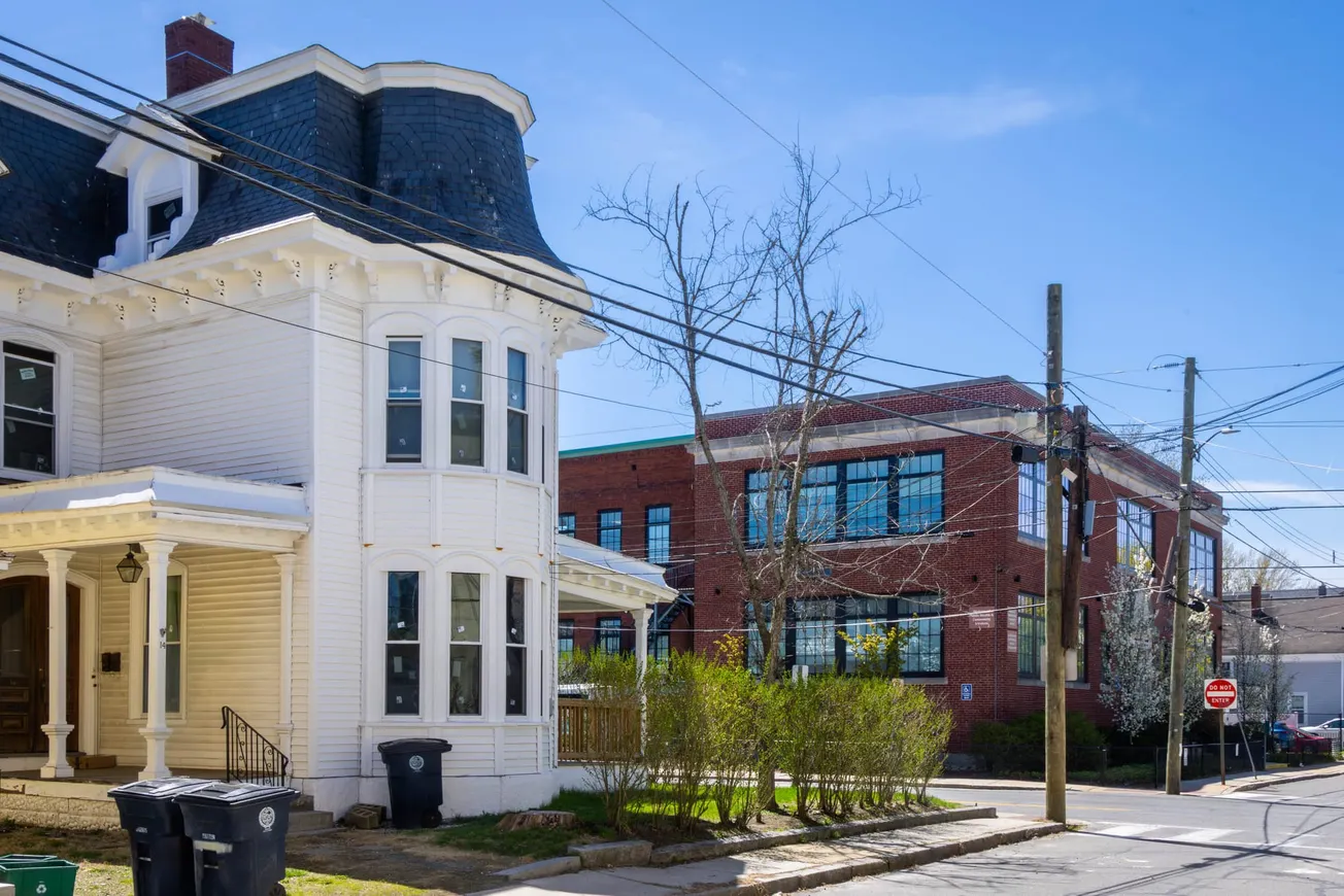 White Victorian-style house at 14 Mulberry St. in Nashua, across from the city’s public health building, a proposed but rejected site for a homeless resource center.