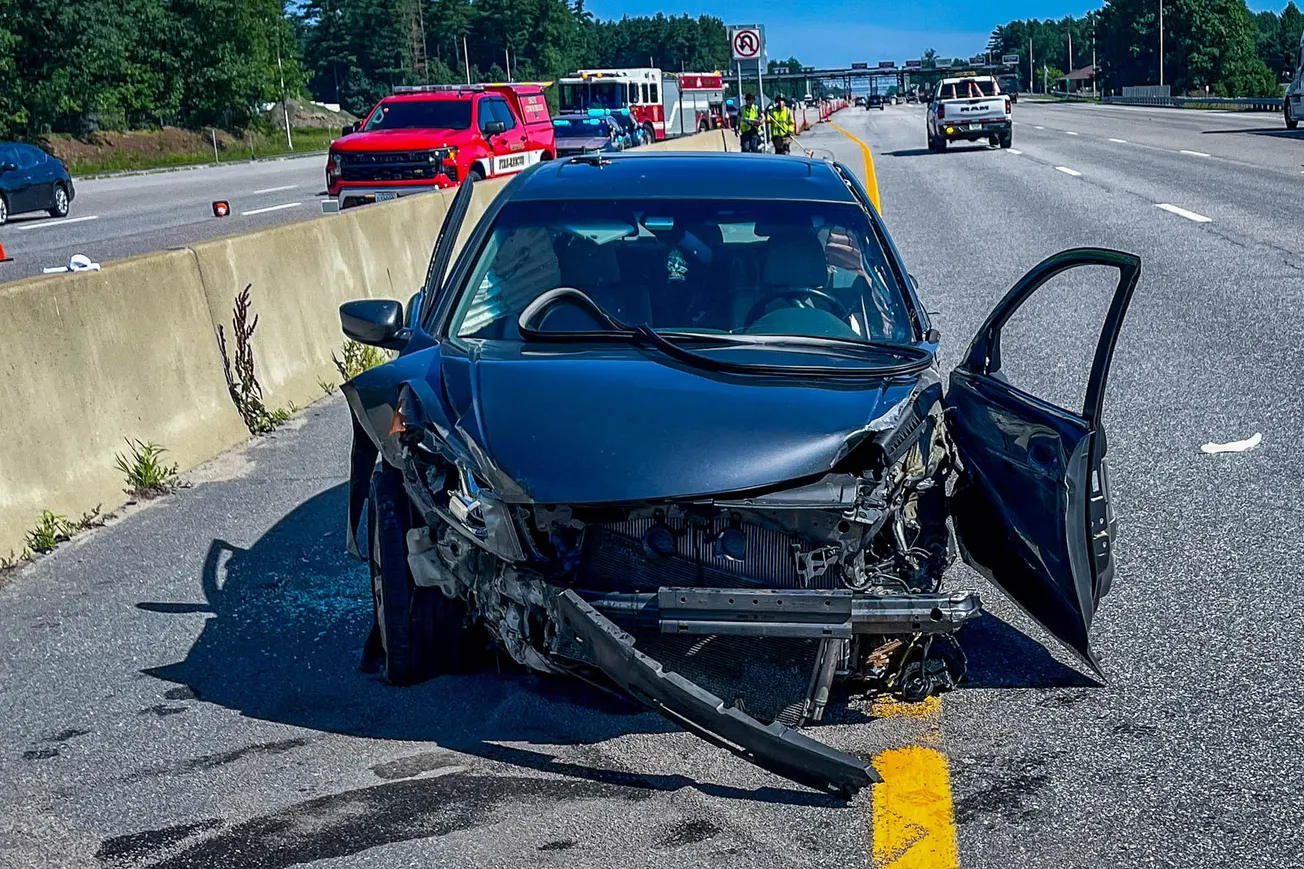 Driver injured in crash at Bedford tolls
