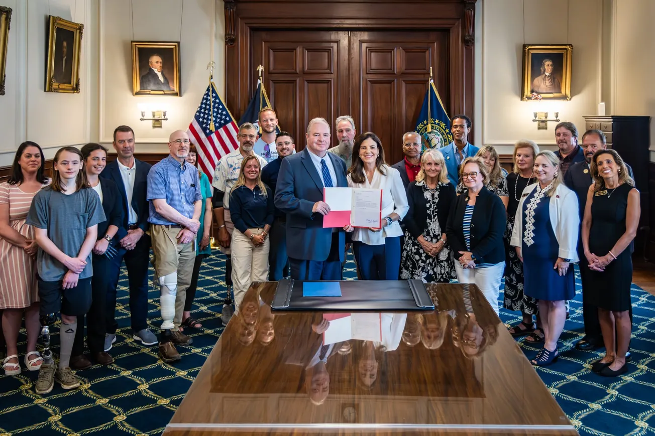 Ayotte signs bill requiring prosthetic coverage for adults