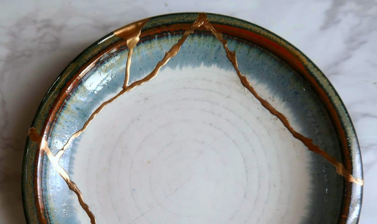 a ceramic plate repaired with gold.