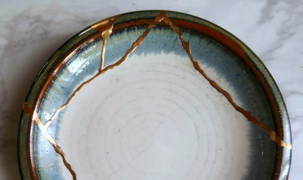 a ceramic plate repaired with gold.