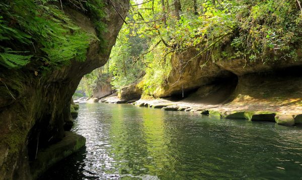 the glacier-carved canyon walls and greenish river of the green river gorge. 