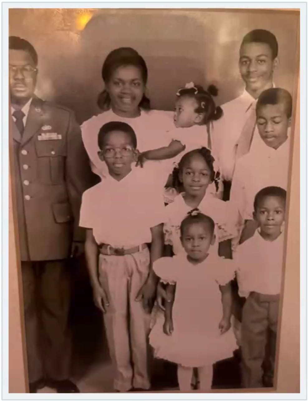 Family portrait shared by Chris Jones showing his parents and their seven children.