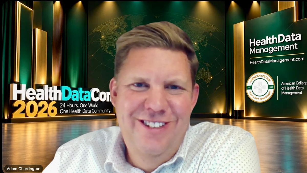 Adam Cherrington presenting on patient trust and AI at HealthDataCon 2026.