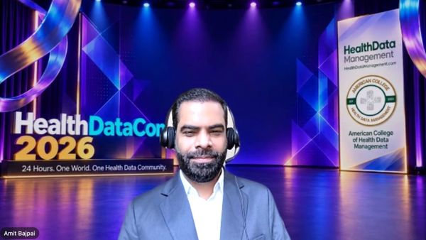 Amit Bajpai presenting at HealthDataCon 2026.