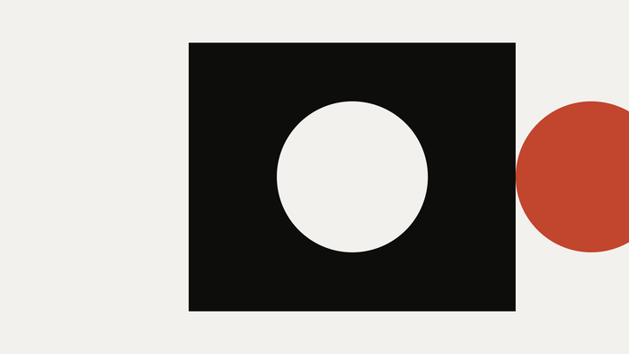 A black frame with an empty round socket and a vermilion disc outside it, an abstract cut-paper illustration for the article “European AI Independence Is Fiction. We Do Not Have the Model.”