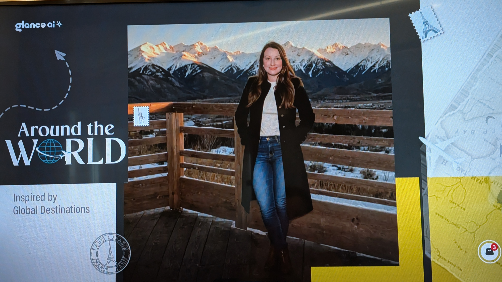 A photo of the author standing in front of a mountainous range. 