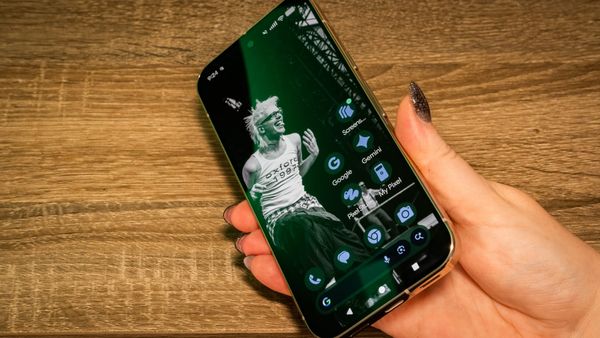 A photo of a person holding the Pixel 10 Pro off to the side