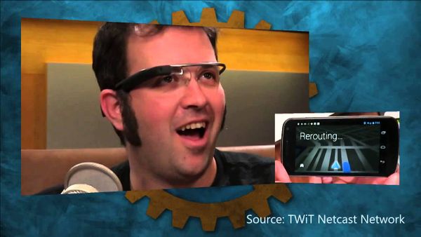 A photo of Ron staring wowingly at Google Glass on his face