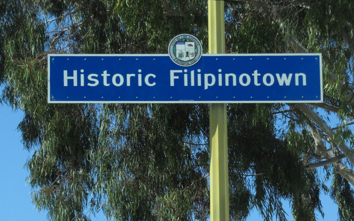 Signage of L.A.'s Historic Filipinotown in front of tree. Credit: Wikimedia / Phatblackmama