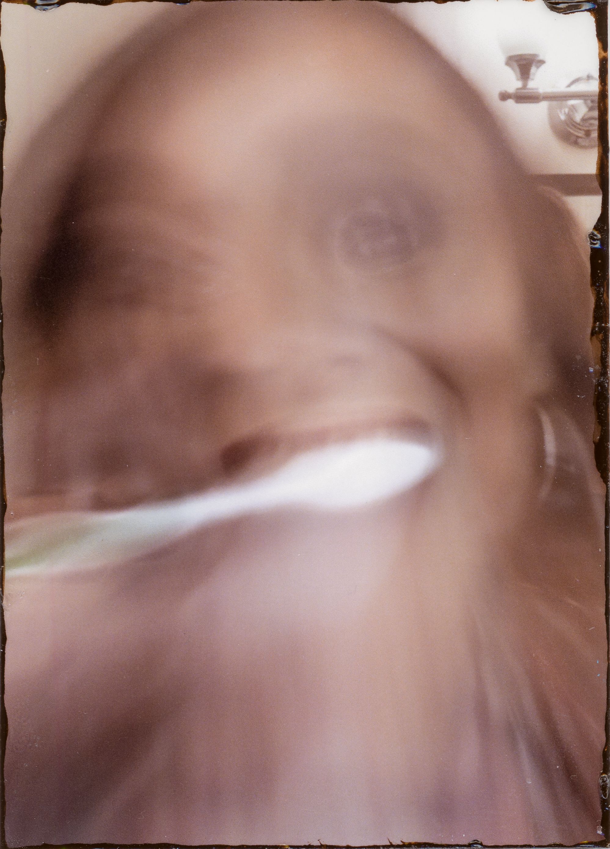 A close up of a person's face

Description automatically generated with low confidence