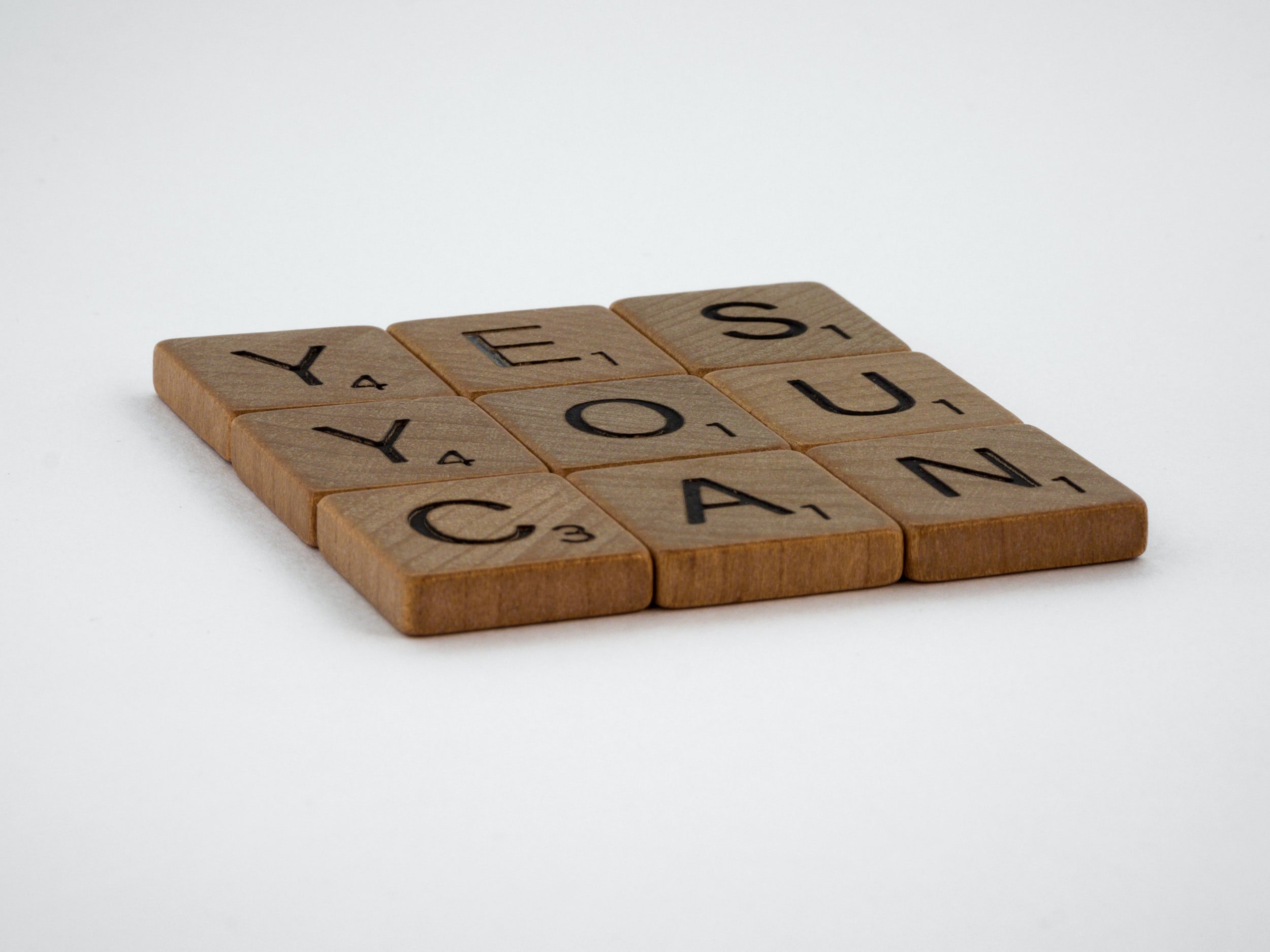 Wooden Letter Tiles Spell "Yes, you can."