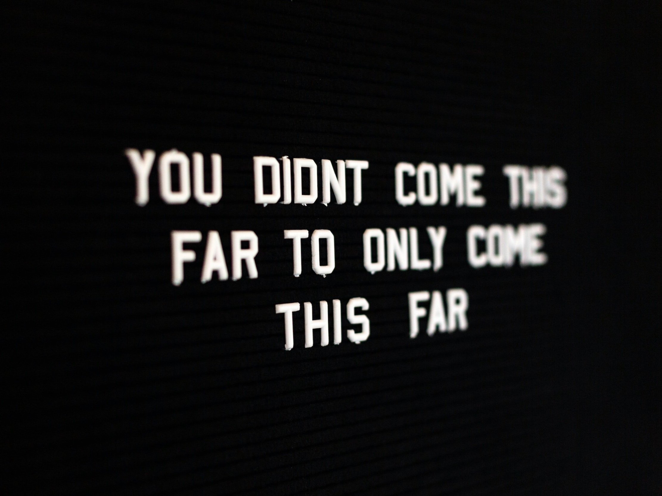 The pegboard letters read, "You Didn't Come This Far to Only Come This Far."