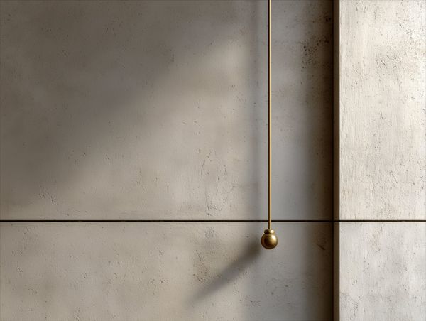 `A brass plumb line hangs taut against raw concrete wall, casting a thin shadow — stillness inside an imperfect surface.`