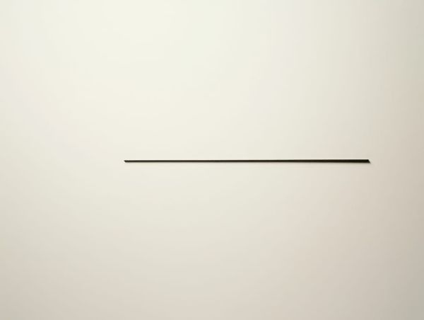 A single fine dark horizontal line set below centre on a soft cream wall, with wide empty space above and below.
