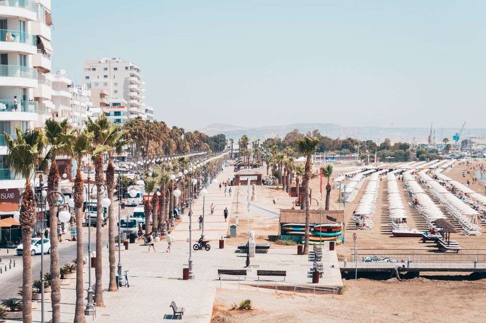 A seafront cafe terrace along the Finikoudes promenade in Larnaca, Cyprus