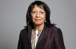 EHRC chair Kishner Falkner; an Asian woman with mid length black hair wearing a burgandy jacket.
