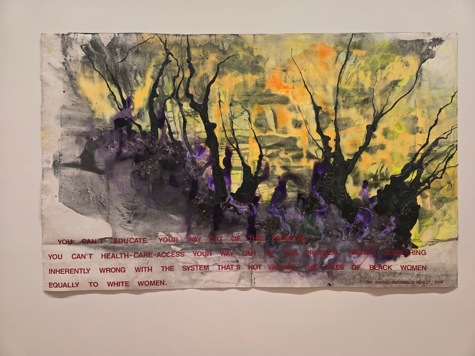 a canvas with yellow orange paint in the background, black and purple bolts of paint vertically, and red text along the bottom. 