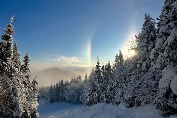 A sundog and halo peeking out above the East Bowl at on a chilly early January morning.  📷 Burke Mountain