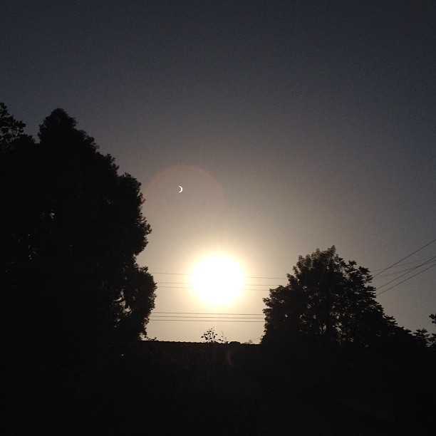 This is a partial solar eclipse. Look at the lens flare and you’ll see it.  (Taken with instagram)