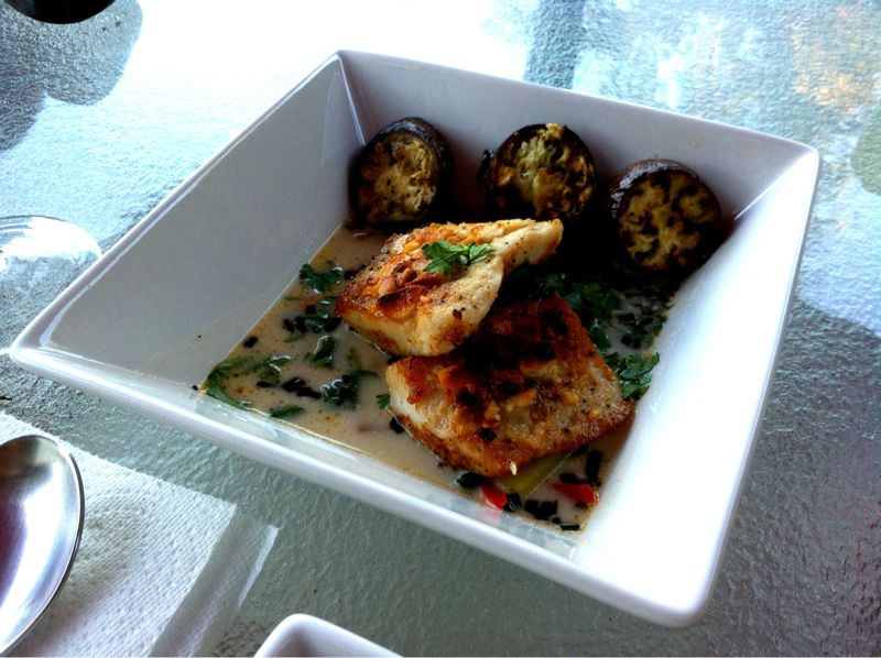 Macadamia nut encrusted Mahi Mahi in a coconut lemon grass broth compliments of my ultra talented woman.