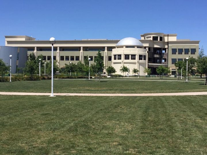 Modesto Junior College Planetarium and Sciences building on the West Campus under blue sky