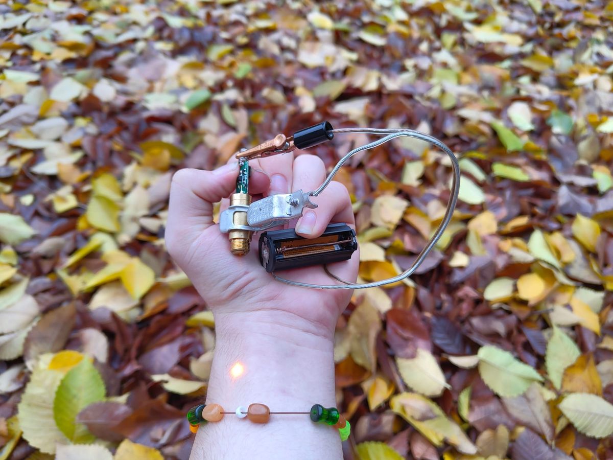 My holding and turning on a laser I put together out of scraps I found.