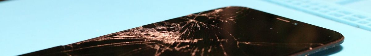 A smartphone with a shattered screen.