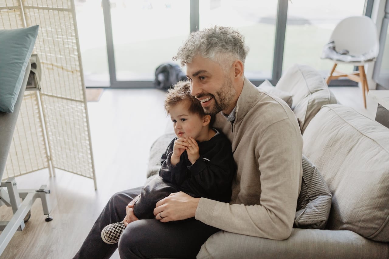 A father and son watching a 4d baby scan in Barnstaple as guests as Sneak-A-Peek Ultrasound.