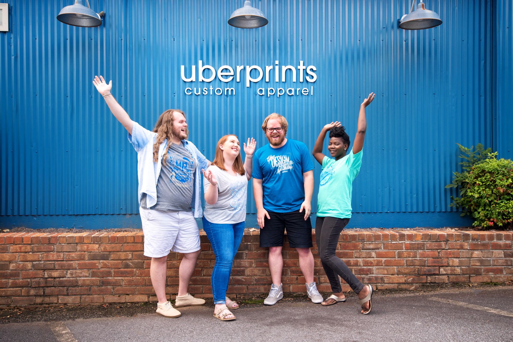 Group photo of some of our customer service and art department team members.