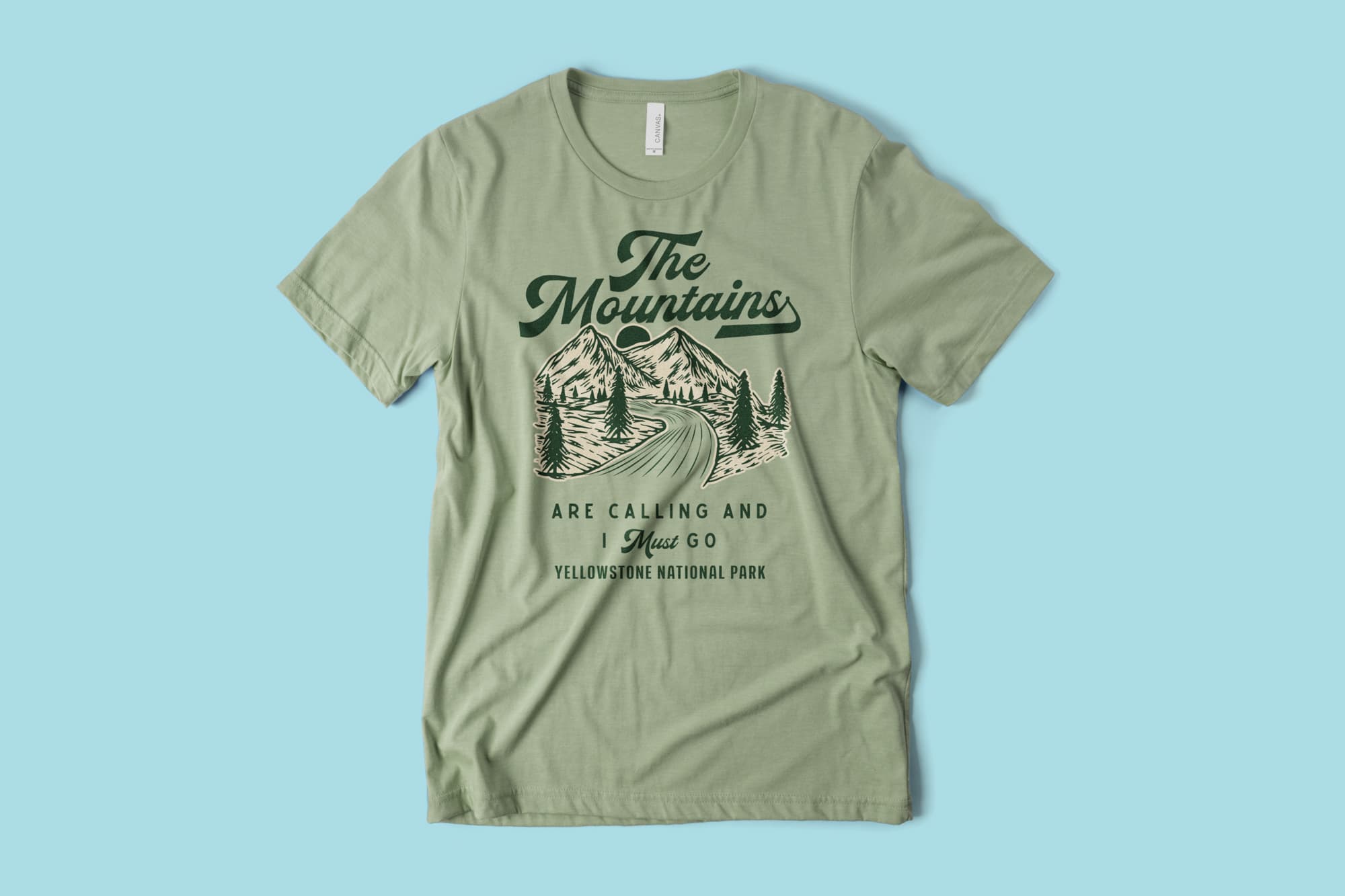 flatlay of a custom vacation t-shirt for a trip to the mountains.