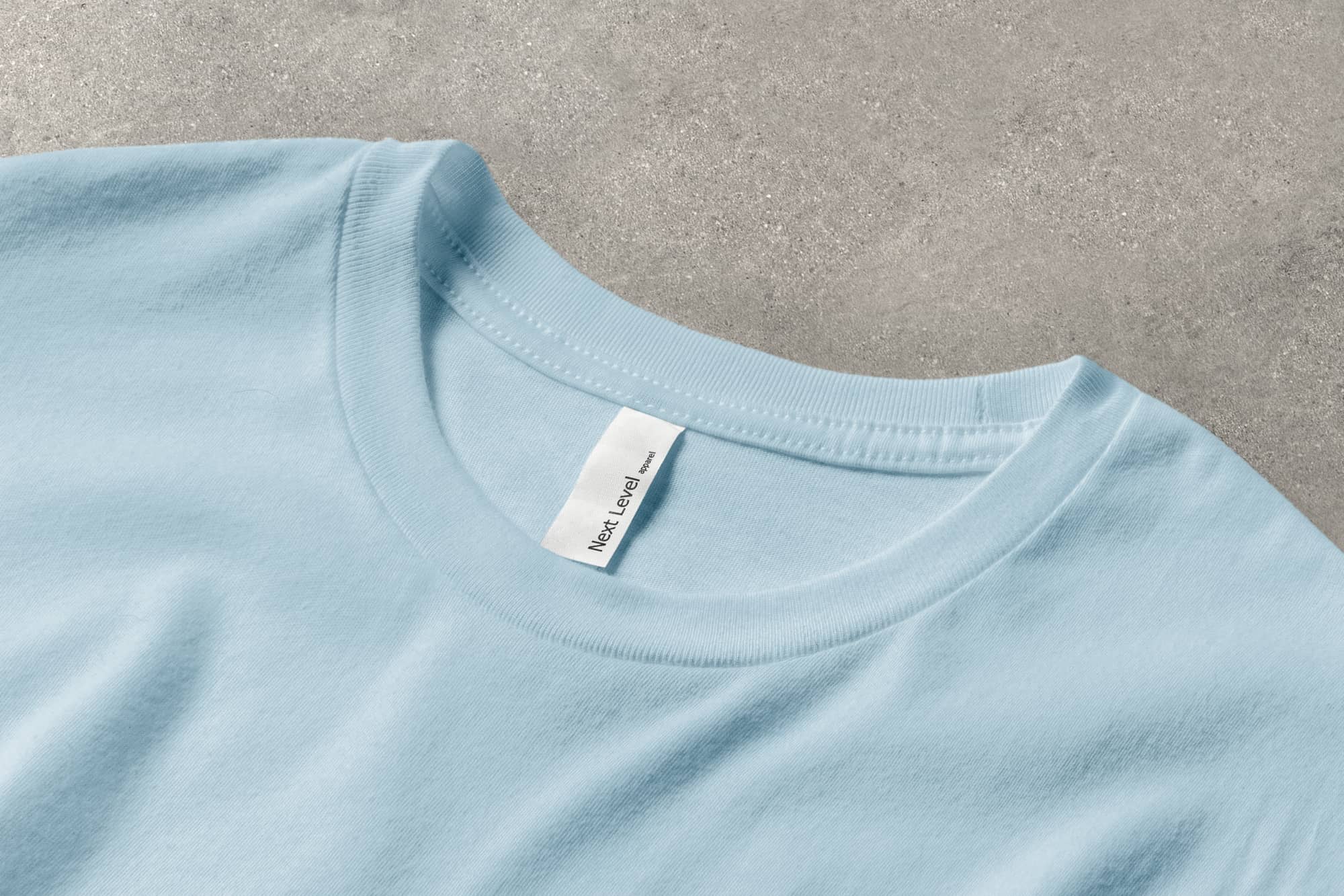 Detail image of the Next Level Fitted Crew's collar and tag