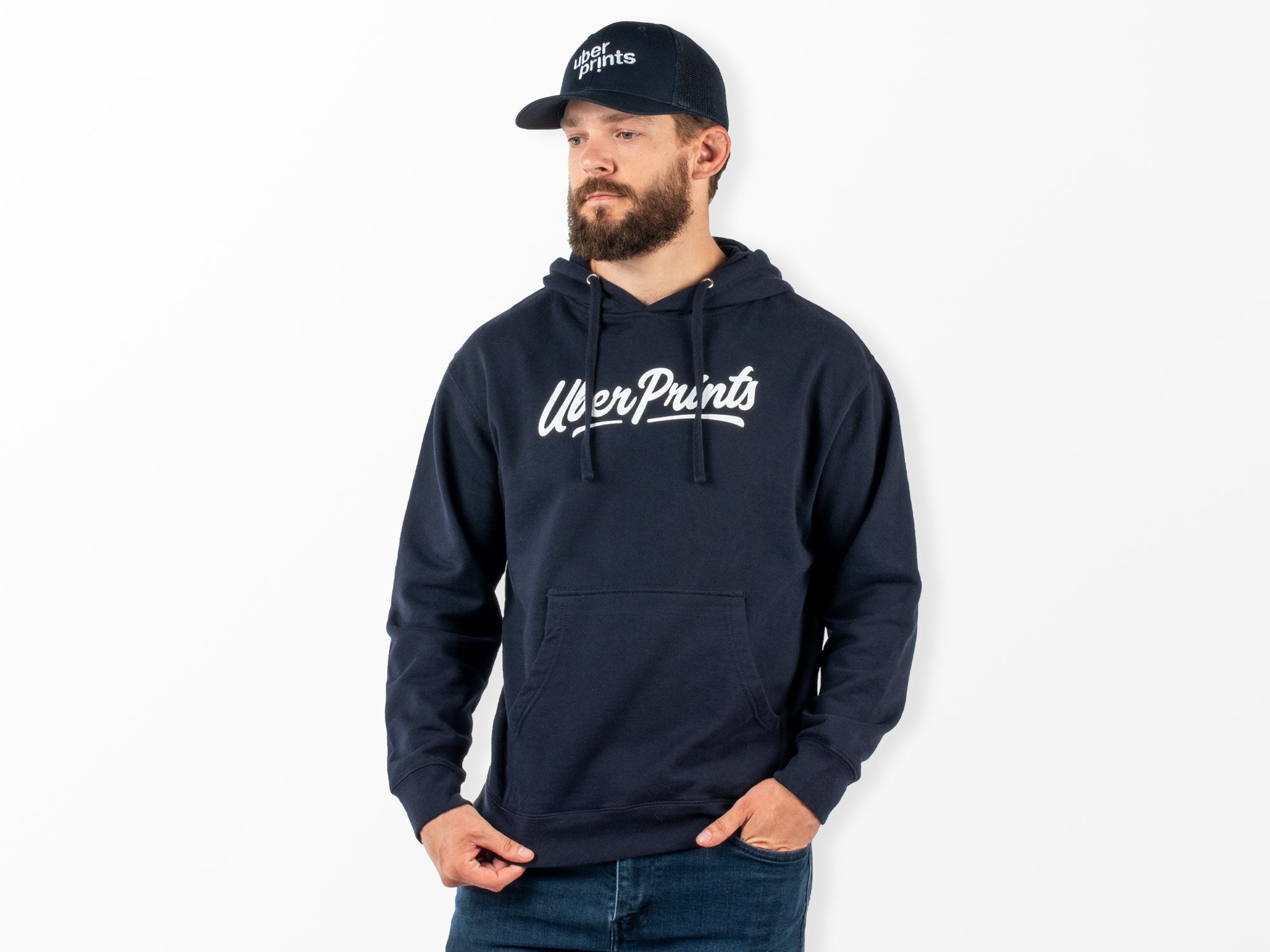 A male model wearing the Premium Hoodie to show fit.