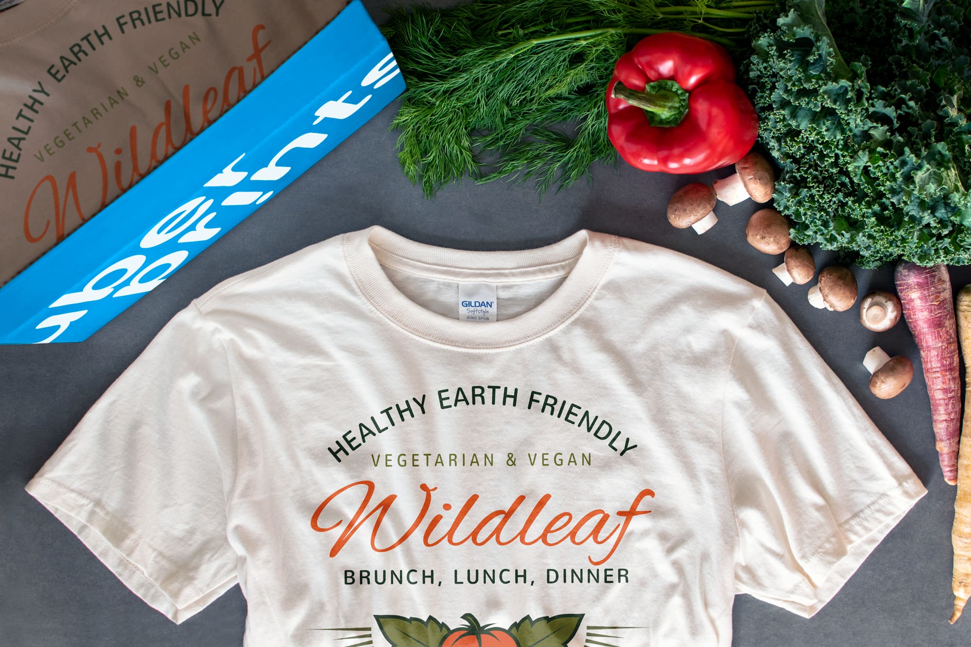 Flatlay image of the final t-shirts for a restaurant that were ordered and delivered