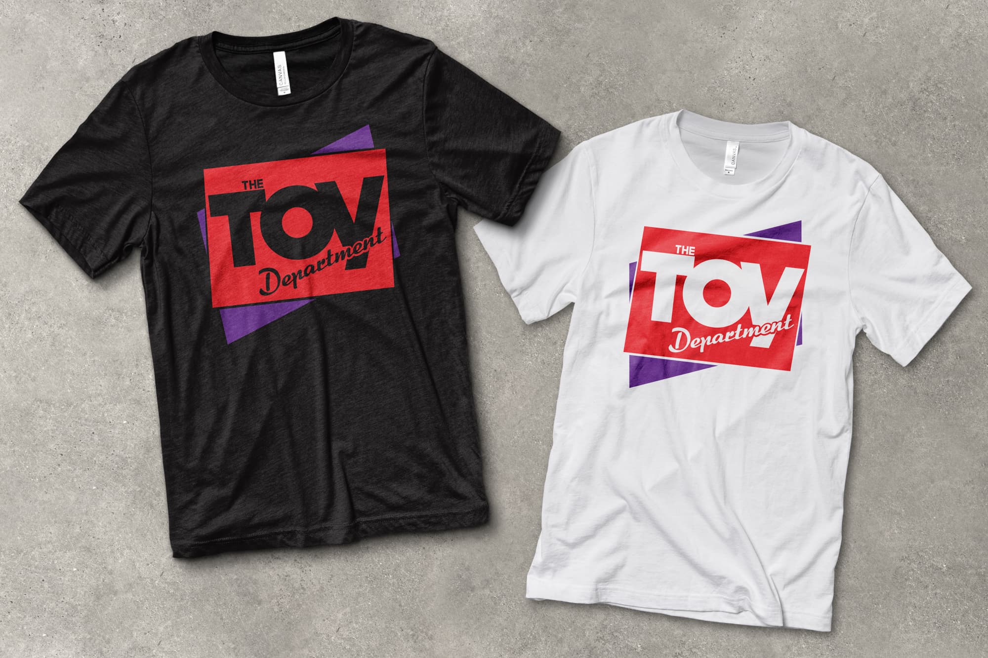 Flat lay of Toy Department t-shirts showing logos and colors.