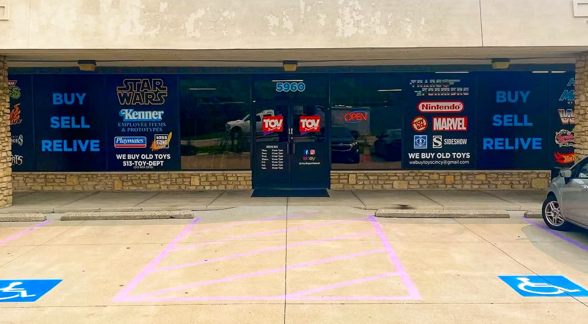 Wide shot of The Toy Department’s storefront.