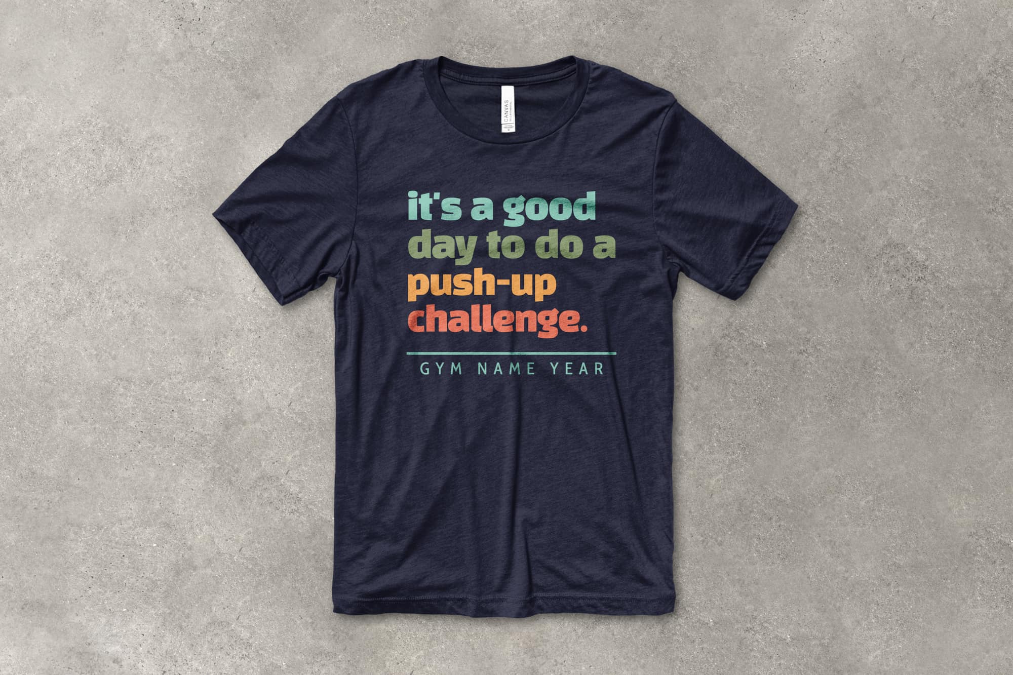 shirt flatlay showing a t-shirt with a customizable wavy text design that says "it's a good day to do a push-up challenge"