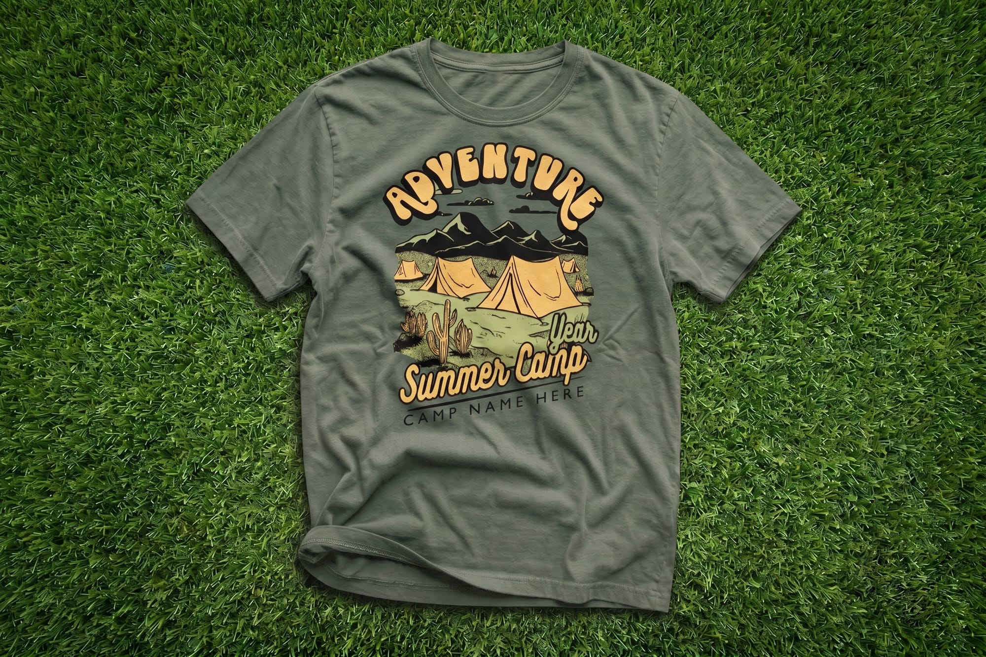 T-shirt on grass, featuring a camp scene with tents and mountains. Text reads "Adventure Summer Camp" with space for a custom name. Conveying outdoor excitement.